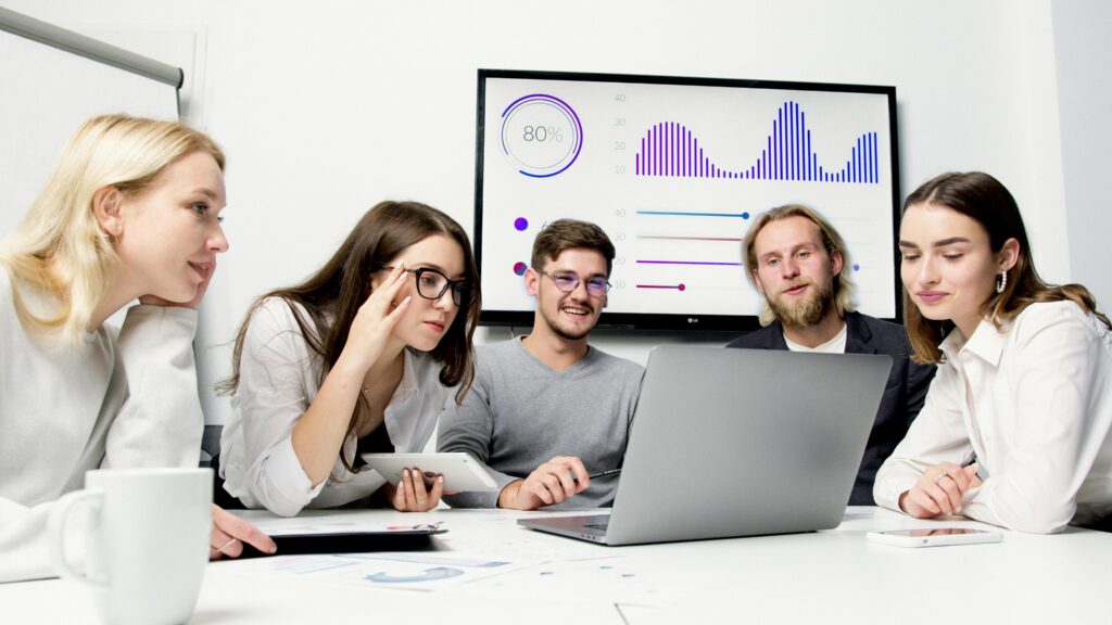 Sales employees in a conference room.